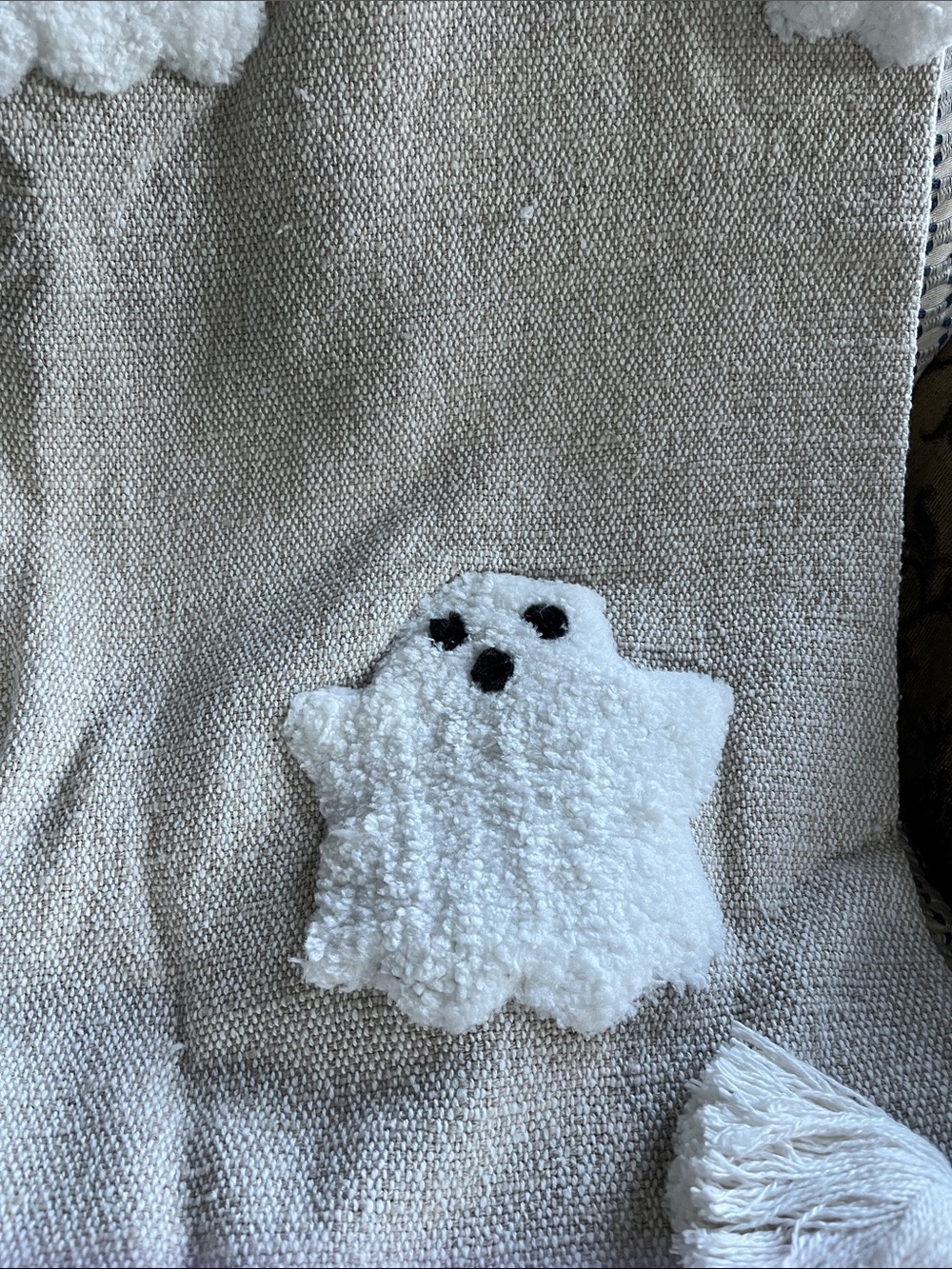 Rachel Zoe sand colored with white ghosts Plush Ghost Accent throw 50×70